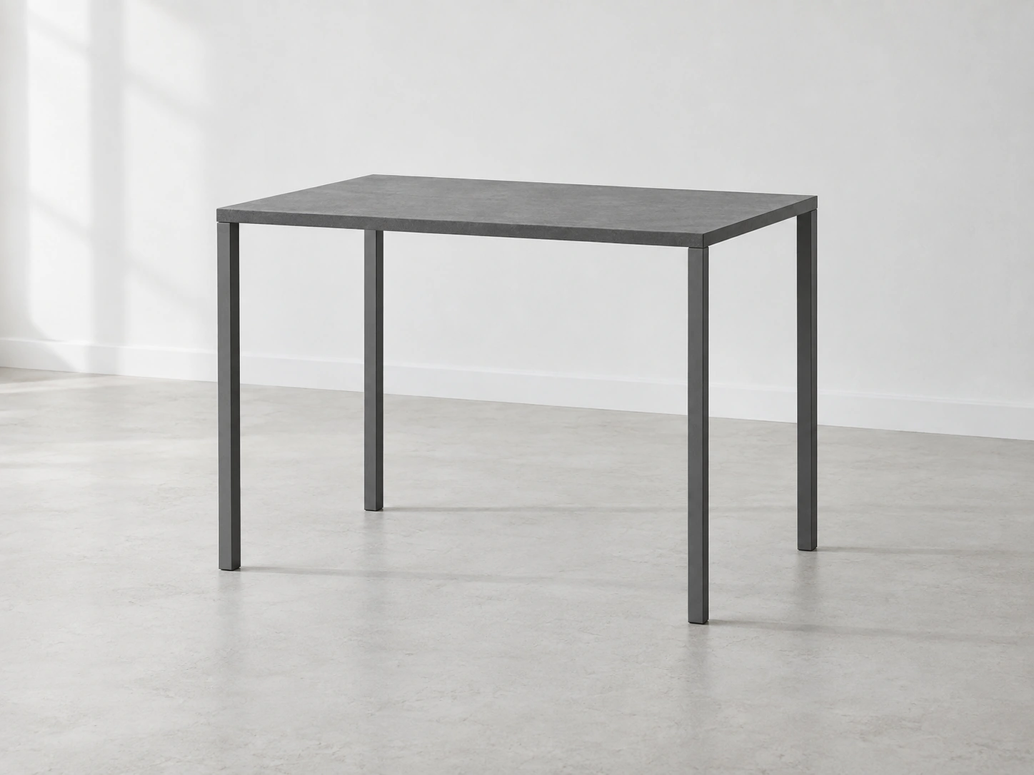 A table in a pale architectural interior