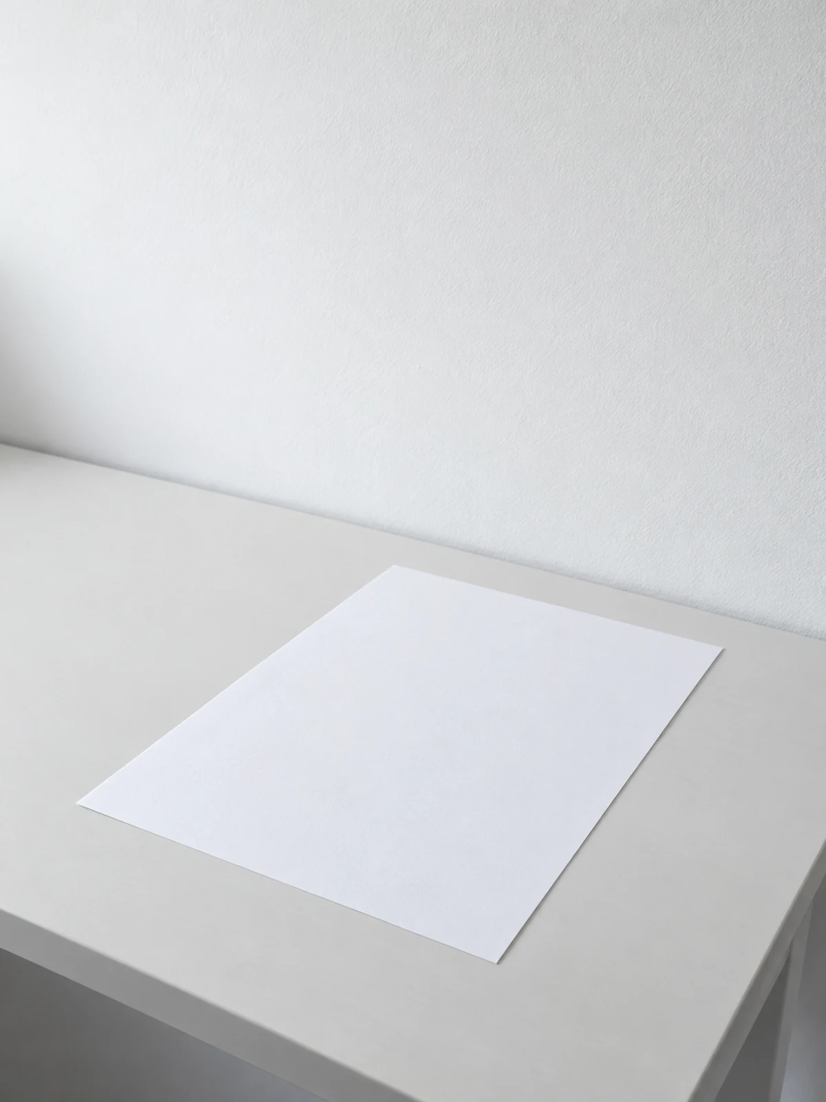 Blank paper on a simple desk